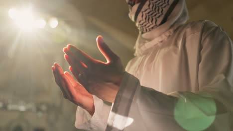a muslim man prays