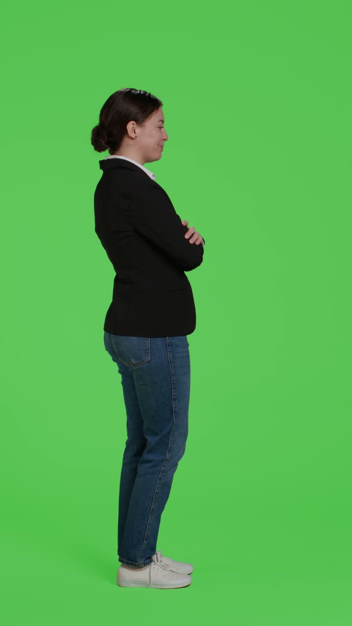 Vertical video: Profile of young businesswoman acting confident wearing suit