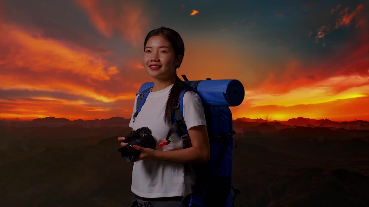 Woman Hiking in Mountains at Sunset