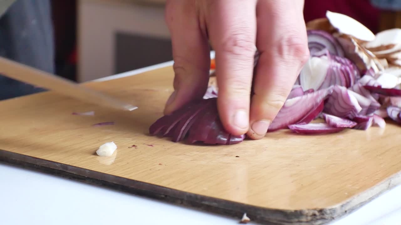 Close up on Caucasian male hands in home kitchen