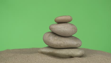 pyramid made of white stones on the sand. panorama. isolated