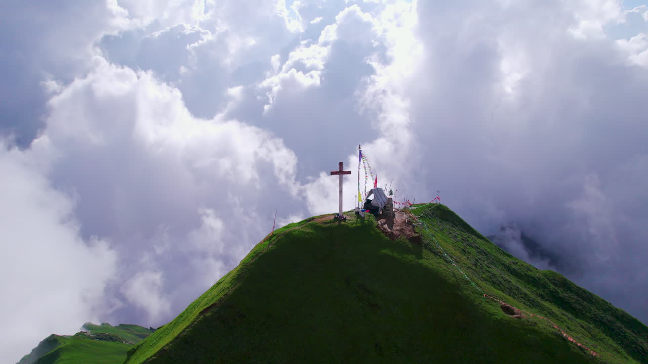 Nepal's Cloudy Sky, Drone shot Jesus Christ Cross Christian in Green Hills