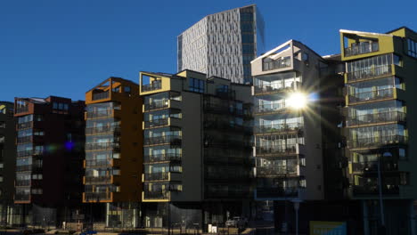 sunlight reflected in window of building in gamlestaden, gothenburg