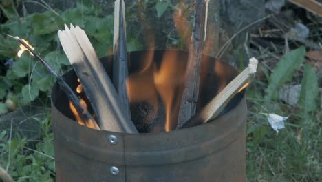 burning fire prepared for the grill party in the slow motion