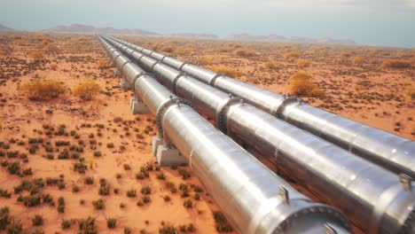 Pipeline-and-oil-pumps-on-the-prairie.-Camera-running-forward.-Three-streams-of-a-pipeline-running-through-a-beautiful,-scenic,-foggy-prairie-environment.-Fuel-transportation-through-a-pipe-system.