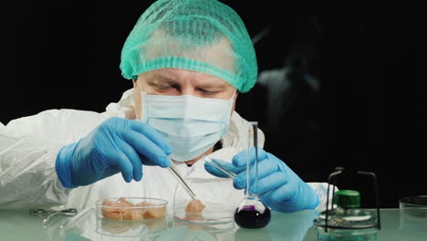 technician checks the quality of the chicken meat in the lab