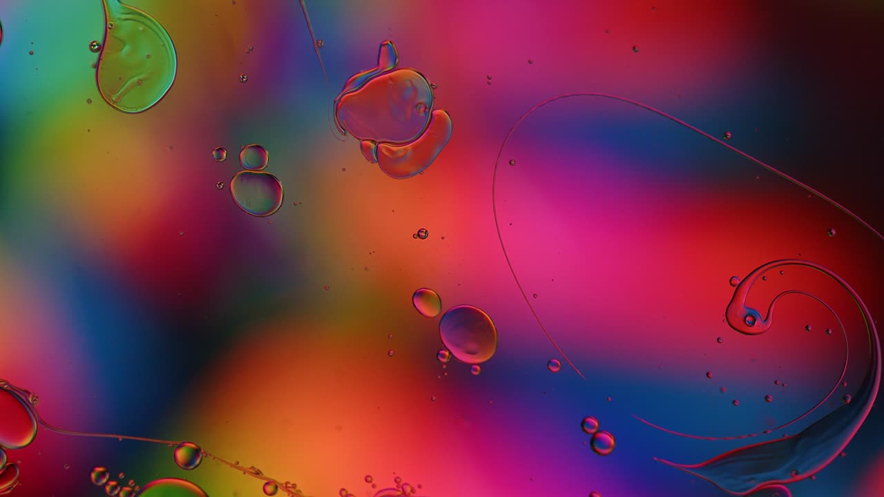 Abstract Colorful Food Oil Drops Bubbles and spheres Flowing