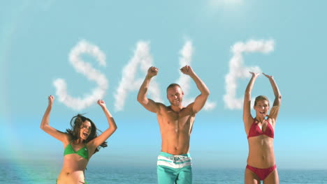 amigos saltando en la playa