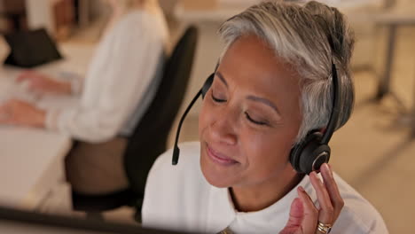 Call-center,-senior-and-woman-talking-in-office