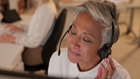 call center, senior and woman talking in office