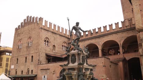 detailed view of the neptune statue atop the historic fountain of neptune in bologna