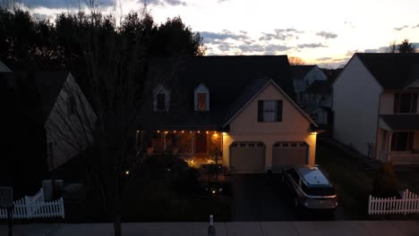 traditional cape cod home at night in usa