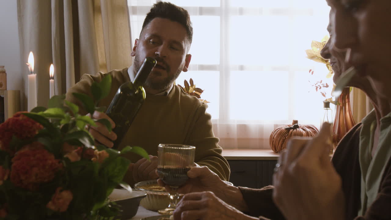 Family Dinner with Wine and Candlelight