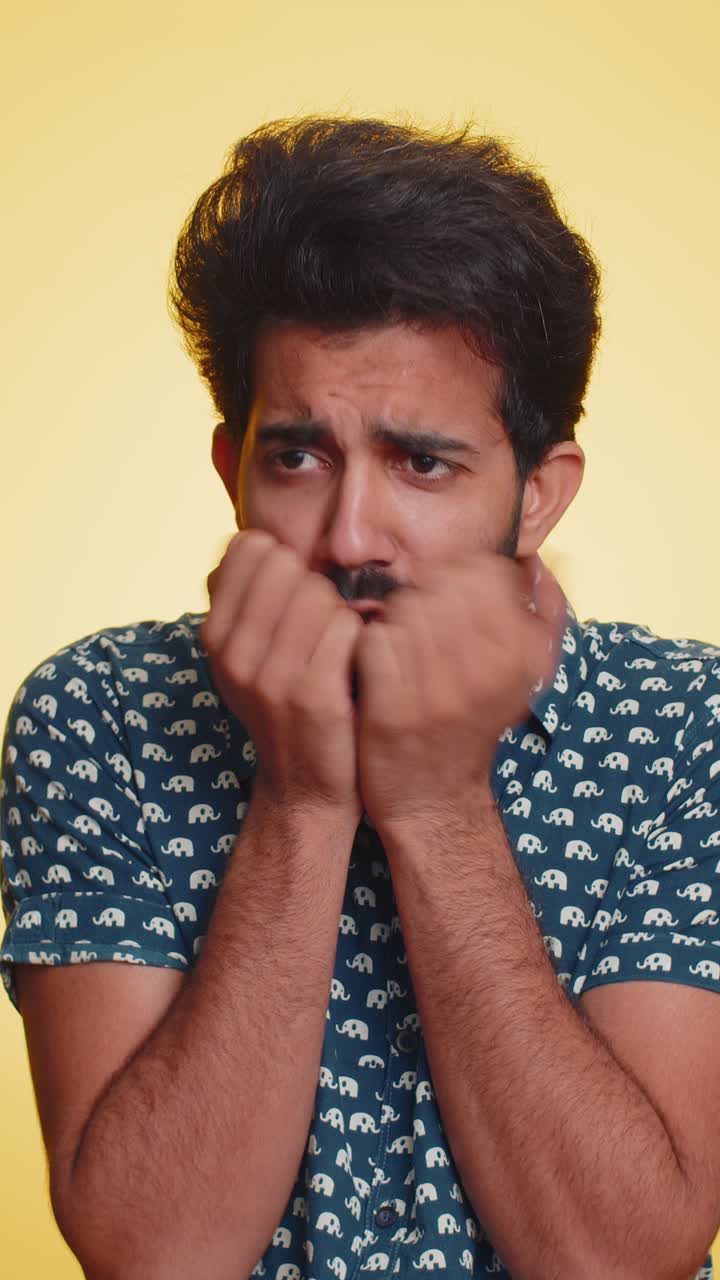 Indian man terrified about danger problems suffering phobia anxiety disorder expresses fear