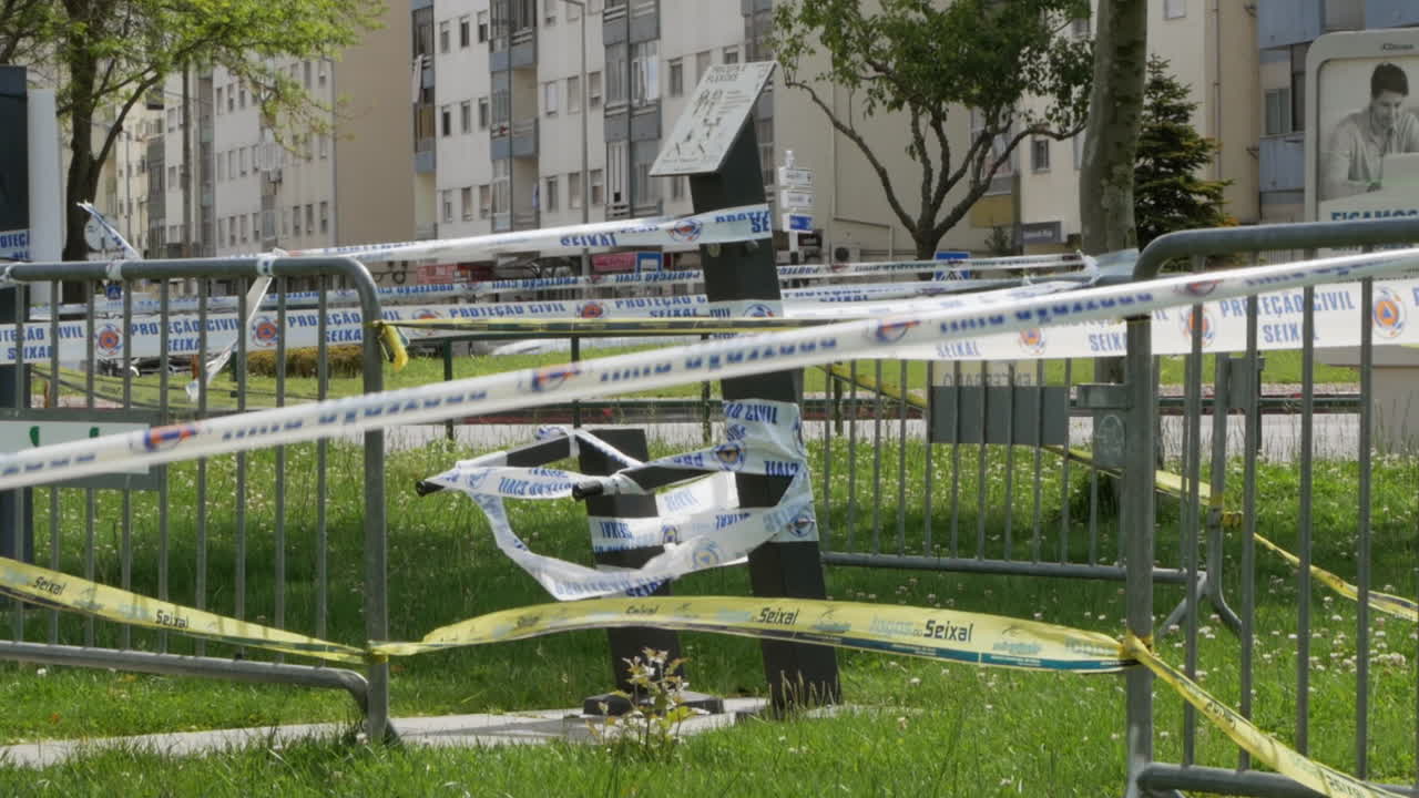 Civil Protection Security Tape Cordons Off an Area in an Urban Setting