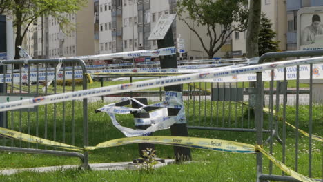 civil protection security tape cordons off an area in an urban setting