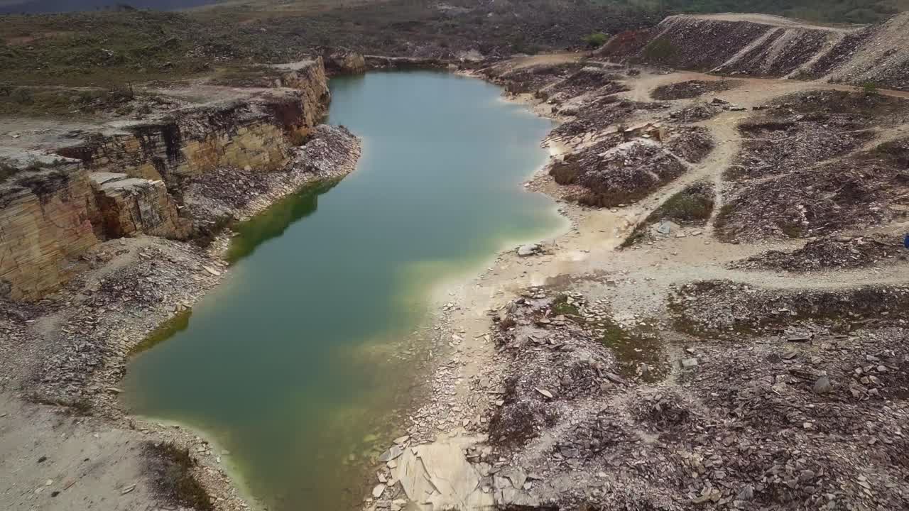 A scenic quarry with turquoise water in capitolio, minas gerais, brazil, aerial view