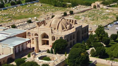 Baha-ud-din-Naqshband-Bokhari-Memorial-Complex-With-Tourists-On-A-Sunny-Day-In-Bukhara,-Uzbekistan