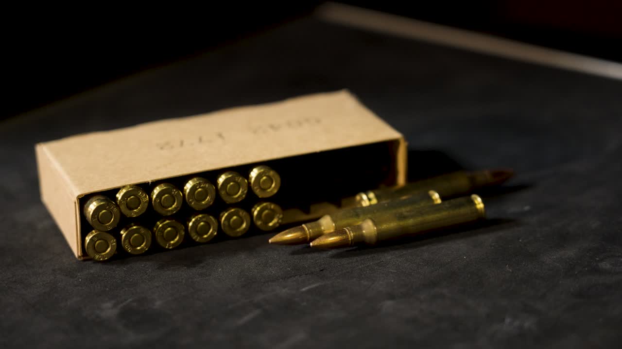 Small box of 5.56 ammunition on display.