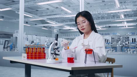 side view of asian woman scientist making experiment with test tube and microscope saying wow in laboratory. carrying out experiments, working in the lab analyzing her finding samples test tube