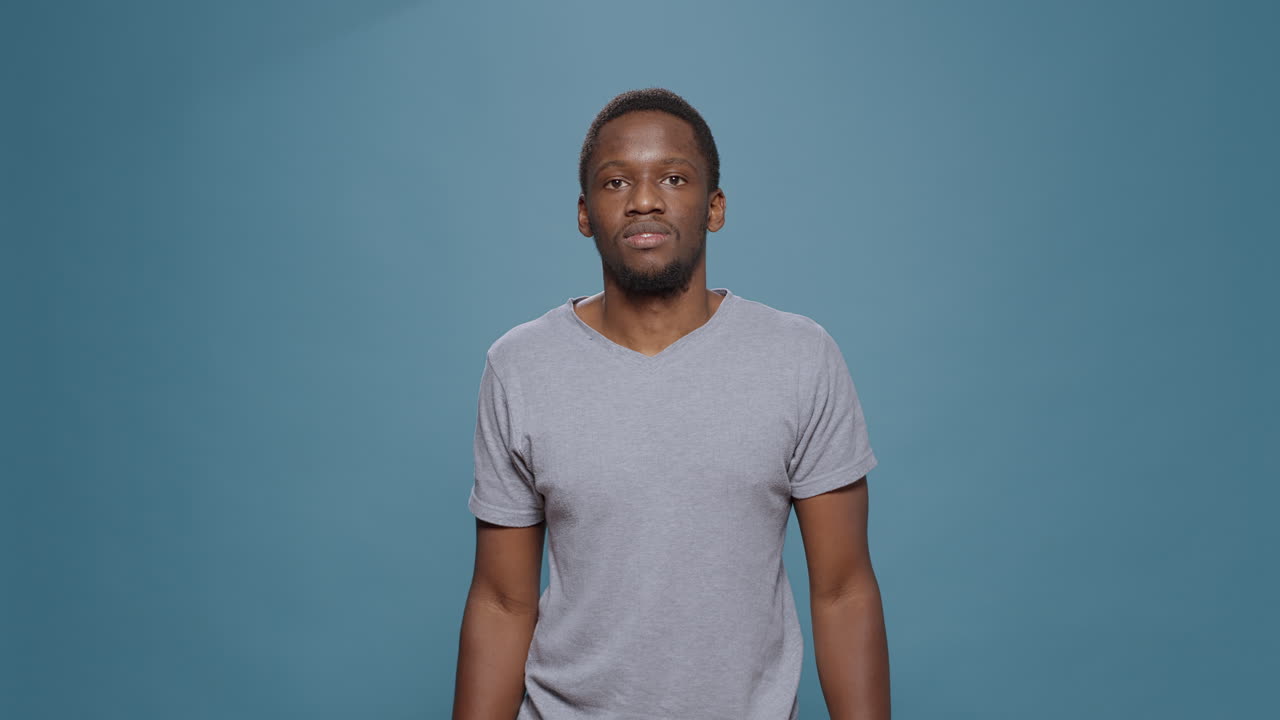 Confused unsure person doing i dont know gesture on camera