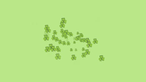 Animation-of-multiple-moving-clover-over-green-background