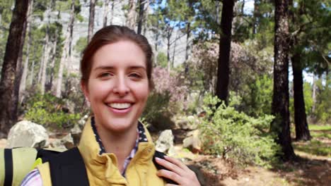 smiling young woman hiking