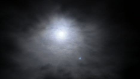 Time-lapse-clouds-with-the-moon-behind-them-in-the-night-sky-1