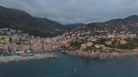 genoa nervi coast with colorful buildings at dusk, aerial view