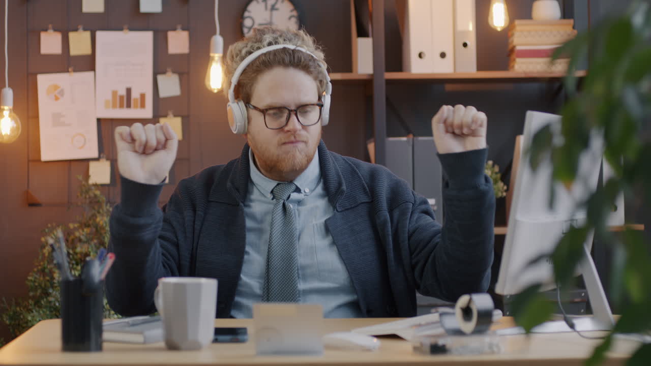 Man Dancing in Office
