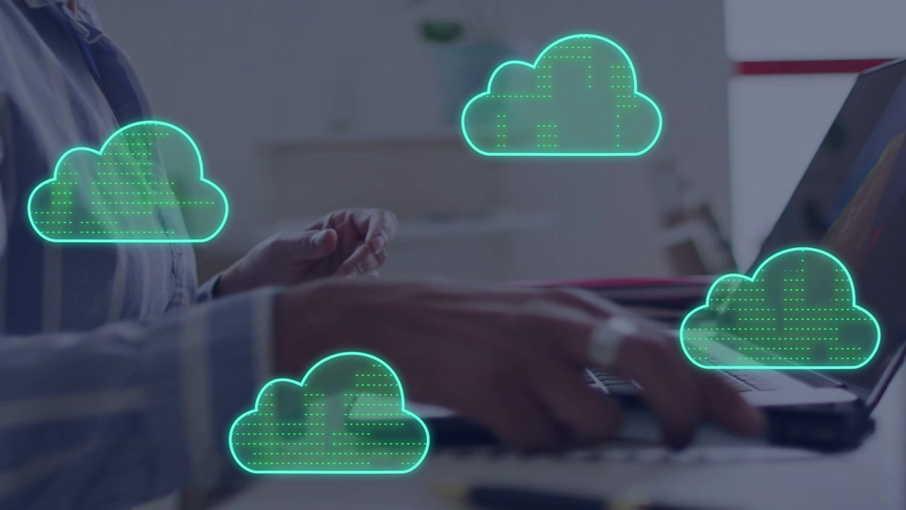 Woman tapping smartphone placing it and typing on laptop while neon green clouds syncing devices
