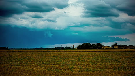 Fast-motion-time-lapse-cloudscape-over-a-farmland-field