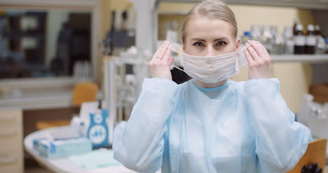 Scientist-Wearing-Protective-Mask-At-Laboratory