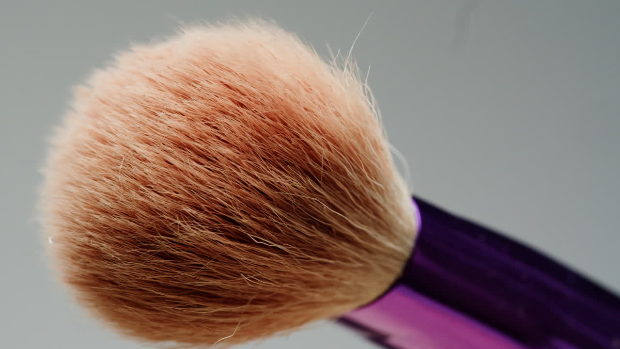 Close-up of a round makeup brush