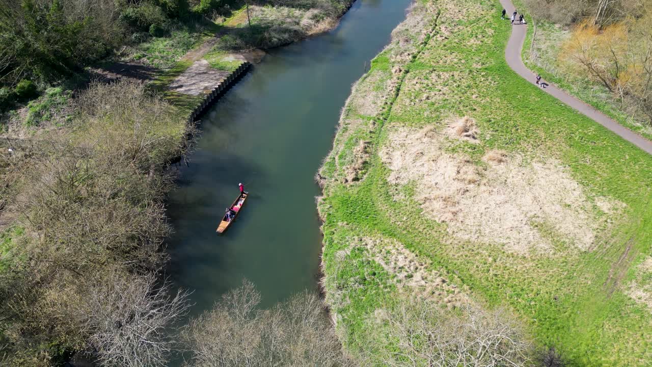 Overhead Drone Shot of Gondola Floating on the River Stour in Canterbury with Passengers Onboard