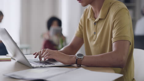 Closeup-of-the-hands-of-a-business-man-typing