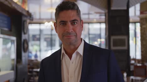 caucasian man in blue suit