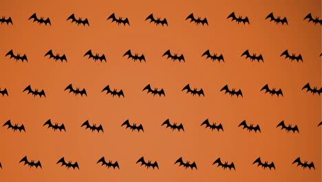 animation of falling bats on orange background