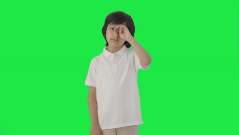 Tired-Indian-boy-feeling-sleepy-and-yawning-Green-screen