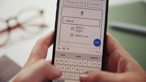 using a travel app on a smartphone