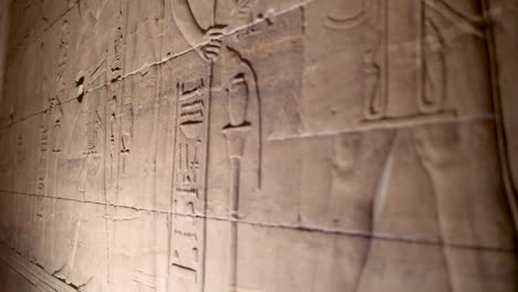 Details of hieroglyphs on the walls inside the temple of Philae, Aswan, Egypt.