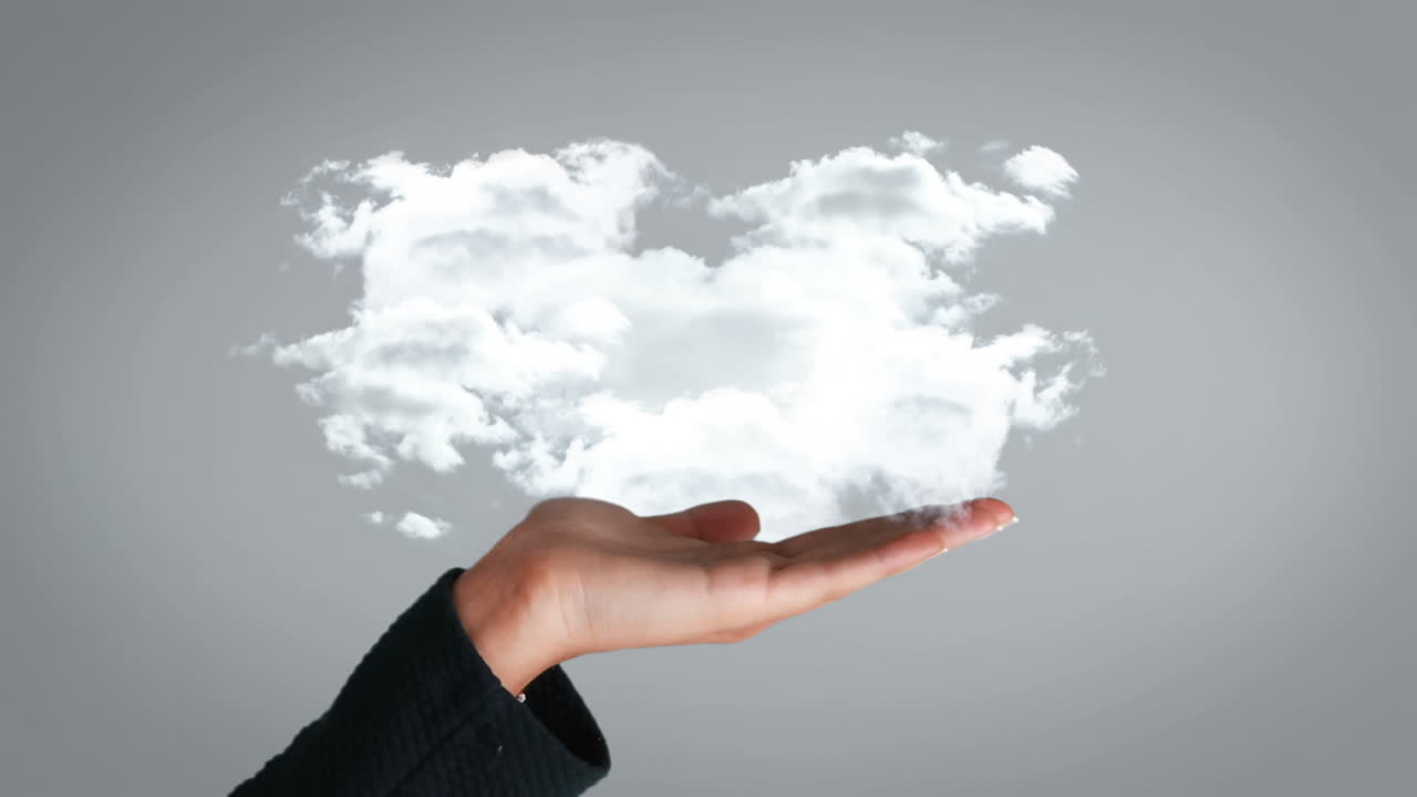 mano que muestra una nube blanca en crecimiento