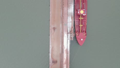 aerial view of bulk carrier loading at dock