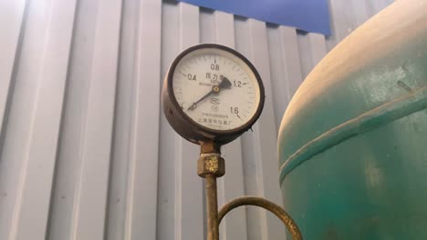 pressure gauge on vertical pressure tank