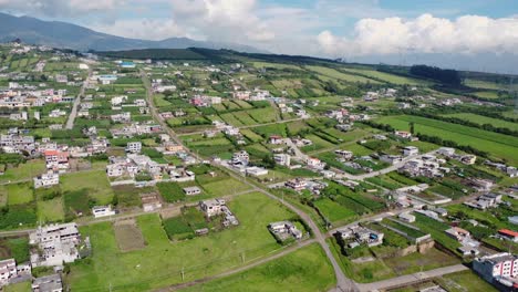 Embark-on-a-visual-journey-with-this-aerial-video-approaching-the-charming-sector-of-Santa-Rosa-in-the-Cutuglahua-parish,-Mejía-Canton