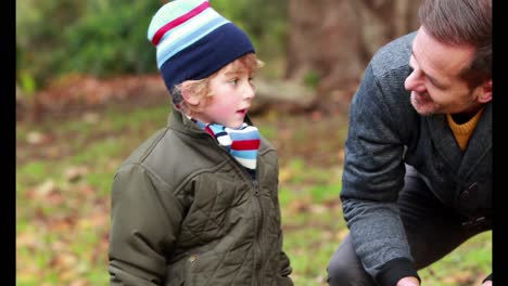 father and son in the countryside on autumn day