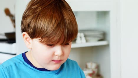 Boy-having-breakfast-on-dinning-table-4k