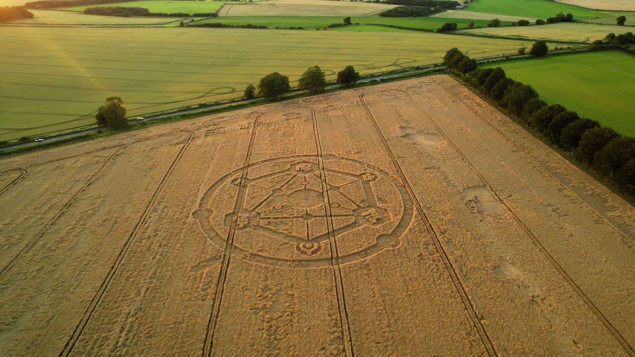 Fortnite game molecular crop circle pattern sunset farmland wheat field aerial view in Uffcot reverse rising shot revealing rural scene