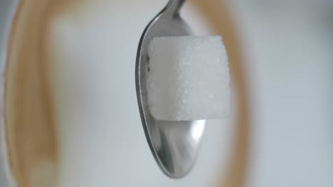 sugar in a coffee cup