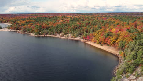 scenic drone flyover beautiful forest and lake in canada